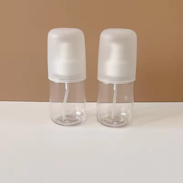 Travel Cosmetics 100ml Pet Mini Sprayer Bottle Plastic Bottle With Outer Cap