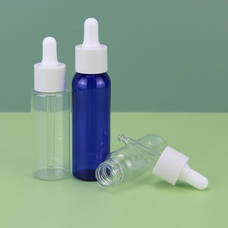Wholesale Round Transparent Glass Dropper Bottle 20ml 30ml 50ml Plastic Packaging for Body Oil Cosmetic Perfume