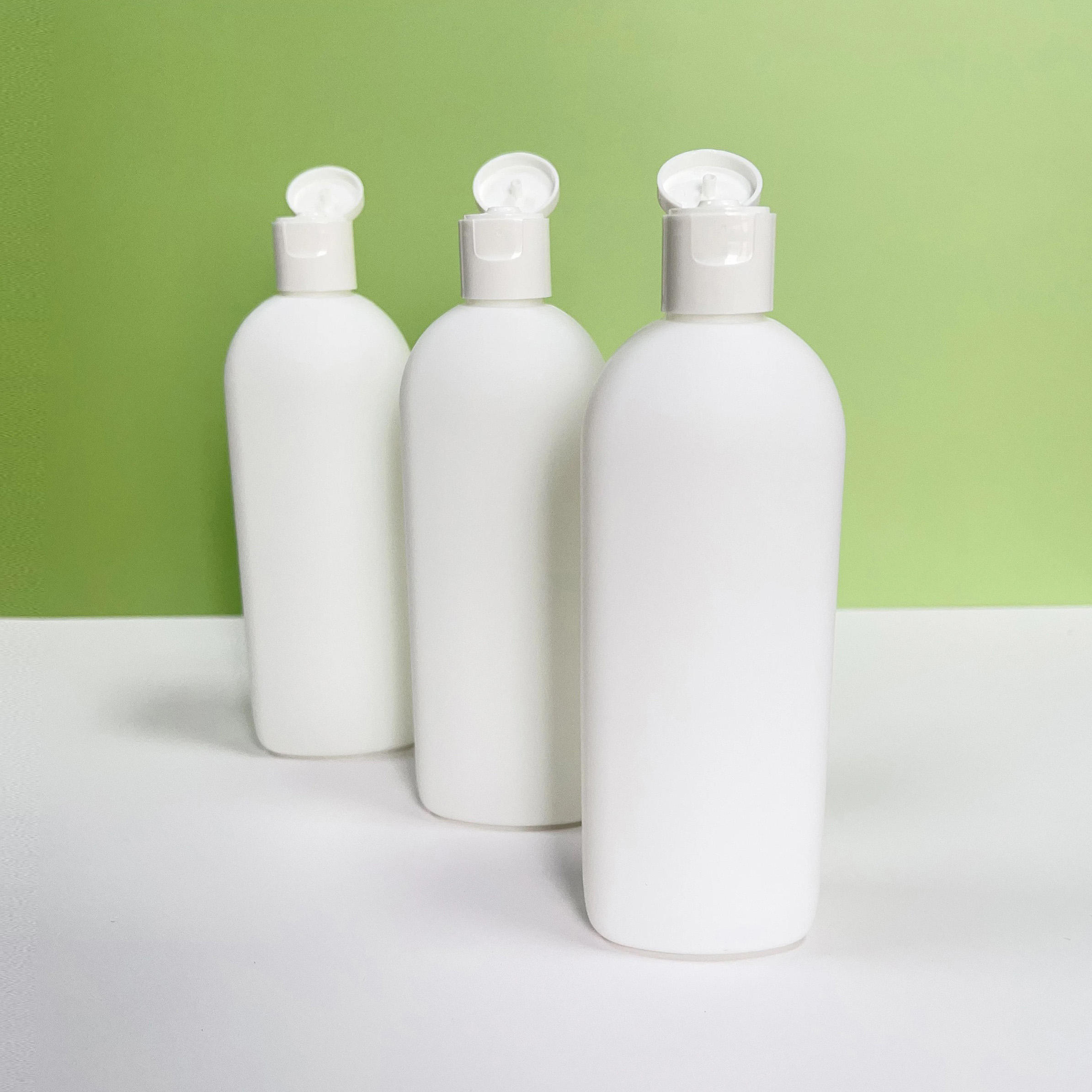New Product 200ml HDPE Material Lotion Conditioner Body Milk Round Shoulder Flat Bottle