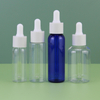 Wholesale Round Transparent Glass Dropper Bottle 20ml 30ml 50ml Plastic Packaging for Body Oil Cosmetic Perfume